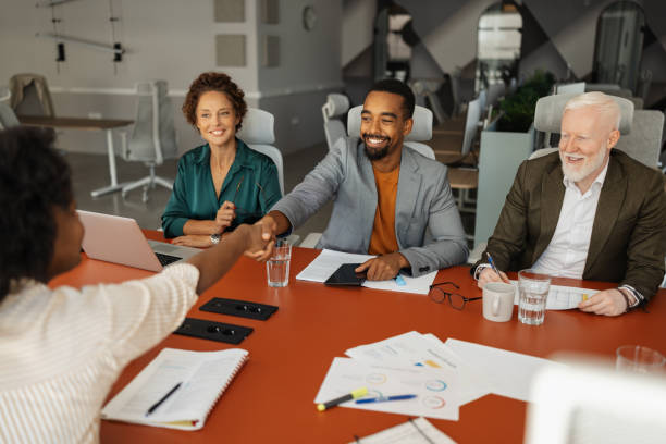 istock Business meeting handshake over conference table 2174841373