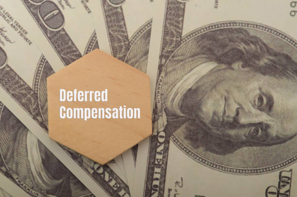 istock The image introduces the idea of deferred compensation, which involves delaying the receipt of income or benefits. 2174845217