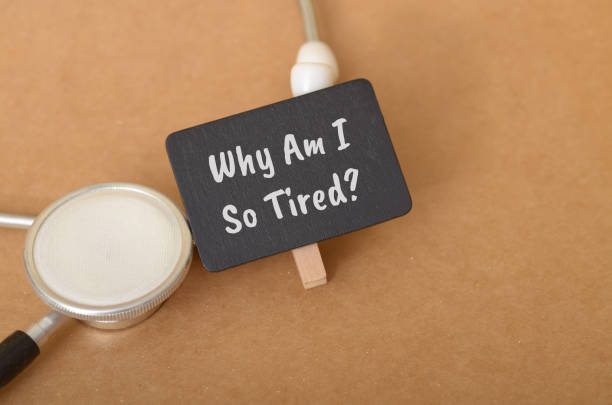 istock The image suggests that fatigue is a common health concern, as indicated by the question Why Am I So Tired? 2174845226