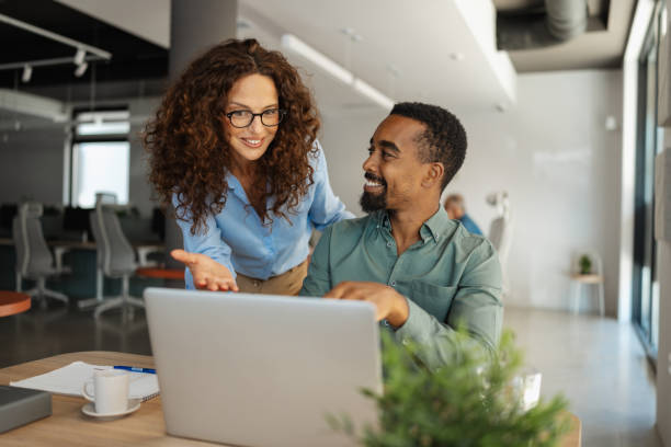 istock Workplace collaboration promoting team synergy 2174846118