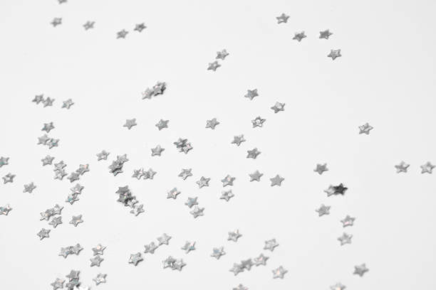 istock sparkles silver stars on white background with text place- Image 2174848012