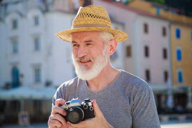 istock Senior photographer arranging his models 2174850992