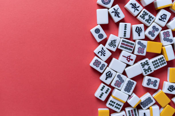 istock Mahjong tiles background on red background 2174852368