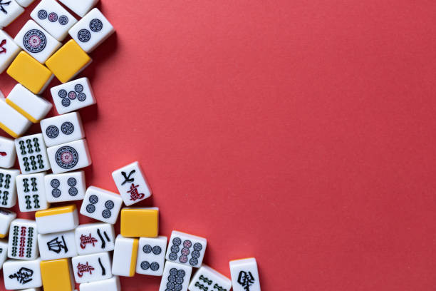 istock Mahjong tiles background on red background 2174852436