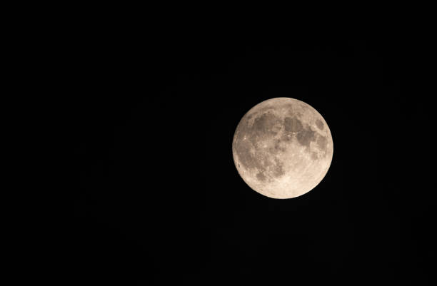 istock Full moon shining in the night sky 2174853751