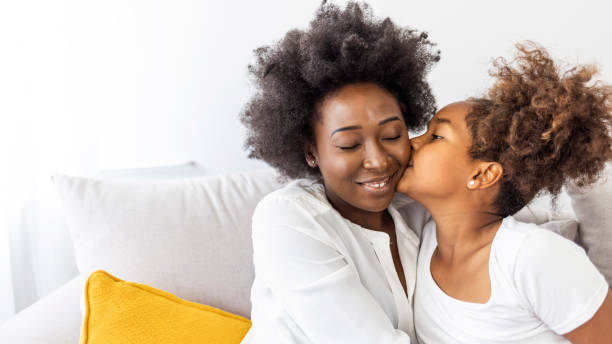 istock Mother and Daughter Sharing a Tender Moment at Home 2174858976
