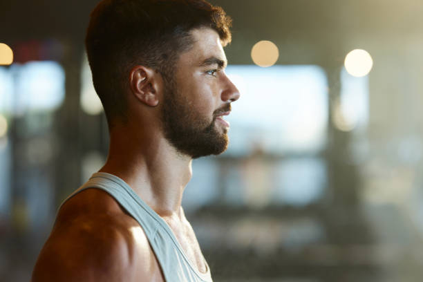 Profile view of happy athletic man.