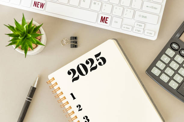 2025 plan. New me, Conceptual words written in notebook. New year resolutions, New beginning. Business idea, business plan, copy space