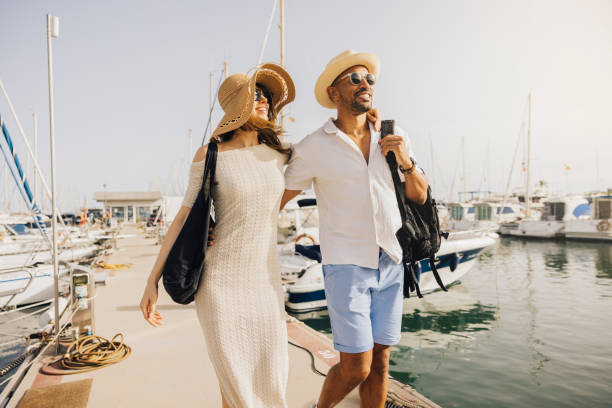 Couple enjoying a sunny day at the marina