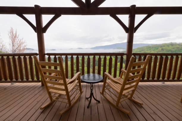 istock Smoky Mountains Cabin Deck with Rocking Chairs 2174871765