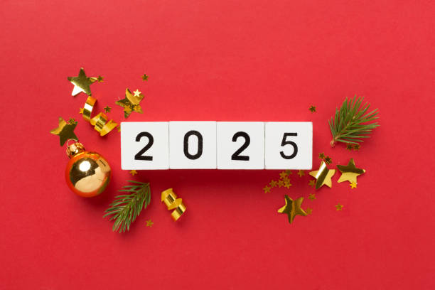 istock 2025 with confetti and decor on color background, top view 2174874443