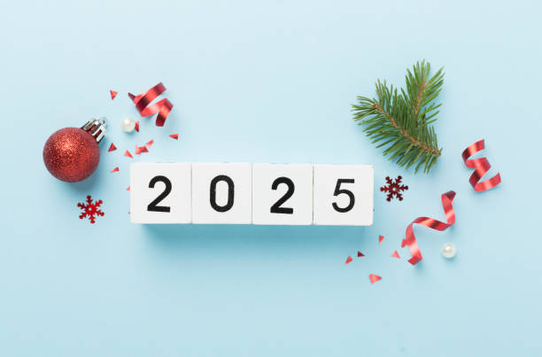 istock 2025 with confetti and decor on color background, top view 2174874459