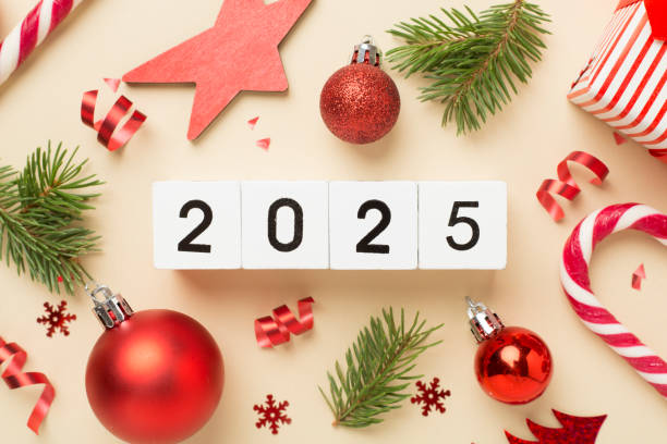 istock 2025 with confetti and decor on color background, top view 2174874460