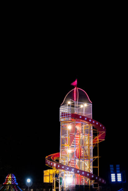 istock 'Witney Feast' Travelling Fairground Ride - Illuminated 'Helter Skelter' 2174877192