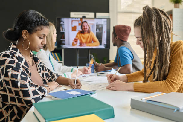 Multiethnic Group of Students in Video Call with Teacher