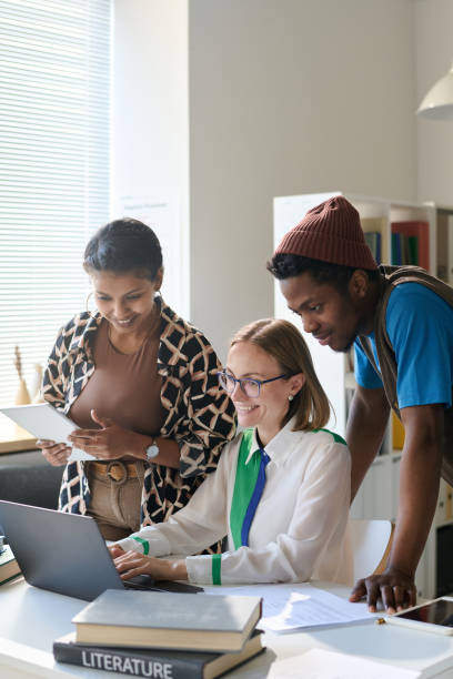 istock Female Teacher using Laptop during Class in School or College 2174878331