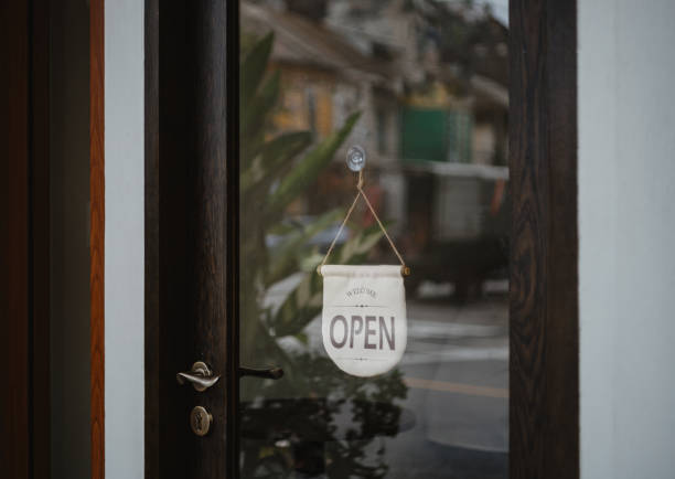 istock open sign hanging outside a restaurant, store, office or other 2174883269