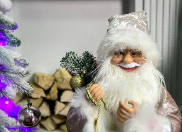istock Smiling Santa Claus in glasses ( toy ) 2174884694