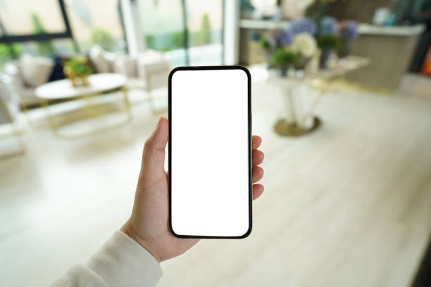 istock Women's hands holding cell telephone blank copy space screen. smartphone with blank white screen isolated. smart phone with technology concept 2174885081