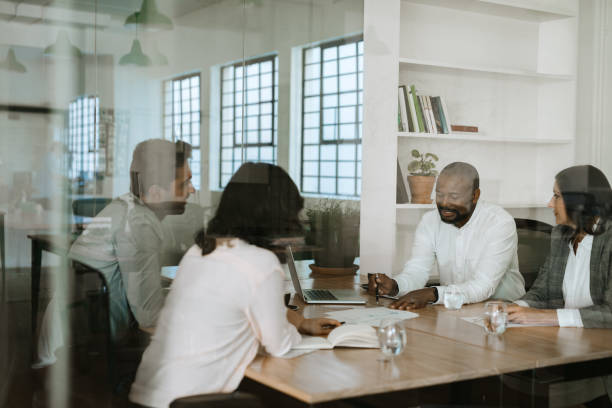 istock Diverse businesspeople discussing work together during an office meeting 2174899214