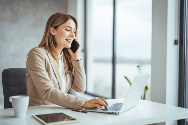 istock Informal Call. Happy young woman calling her friend, talking and asking about something, using laptop. 2174899881