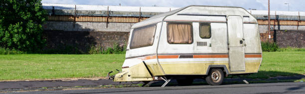 istock Caravan abandoned and dumped in street waiting to be removed 2174901184