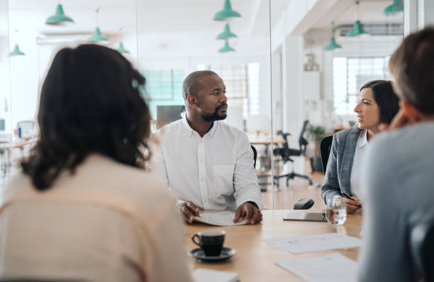 istock Diverse businesspeople having a meeting at an office table 2174904485
