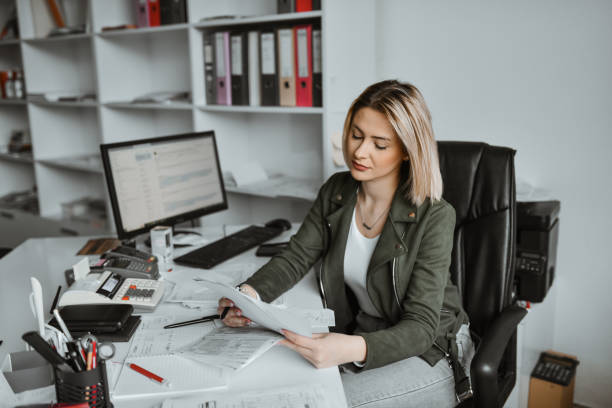 istock Female attorney reviewing court documents 2174908099