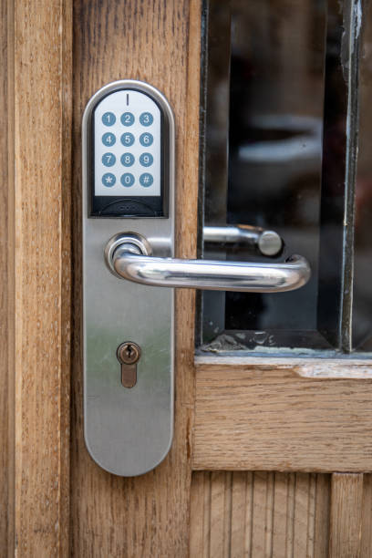 istock Apartment house entrance door with code key. Security 2174910361