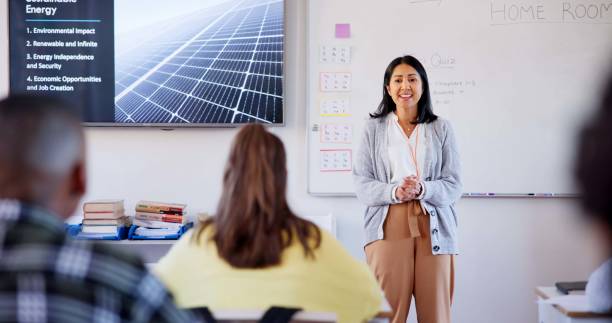 istock Learning, sustainability and lecture with teacher in classroom for education, scholarship and energy. Environment, global warming and future with people at school for course, development and academy 2174910414