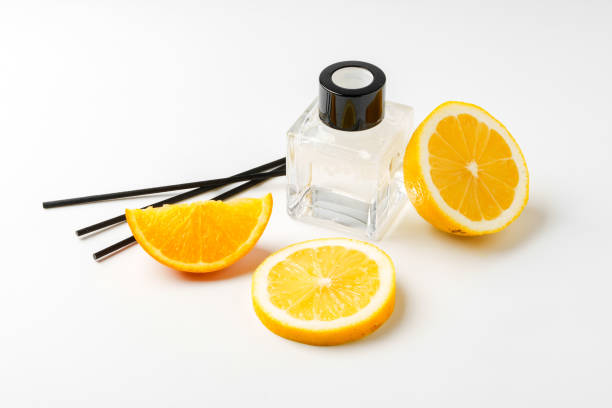istock Aromatic display of essential oils with citrus fruit and chopsticks on a minimalist background 2174911686