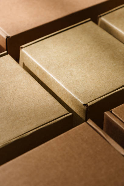 istock Multiple cardboard boxes arranged on a surface for packaging and shipping in a warehouse setting 2174911806