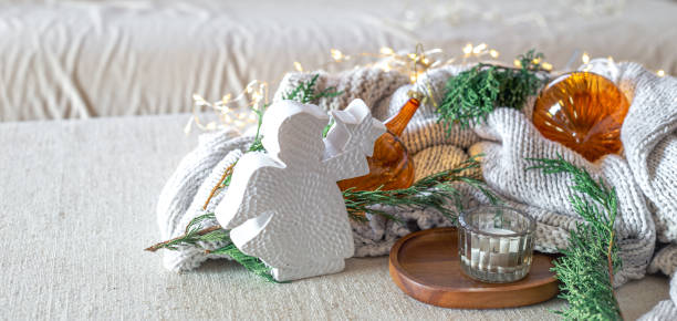 istock Cozy Christmas composition with a candle and decorations. Christmas concept. 2174917092