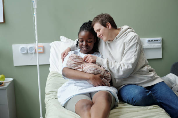 istock Celebrating Newborn Arrival in Hospital Room Setting 2174917912