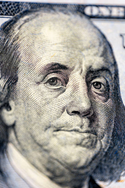 istock Close-up image of Benjamin Franklin on 100 bill. Finance concept. 2174918202
