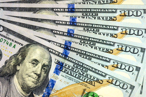 istock Close-up image of Benjamin Franklin on 100 bill. Finance concept. 2174918228
