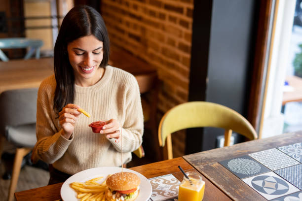 istock Woman enjoying lunch 2174921646