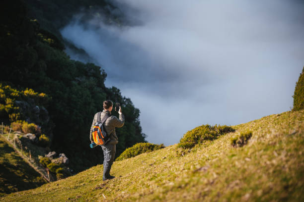 istock Young man hiking Madeira Island. 2174923129