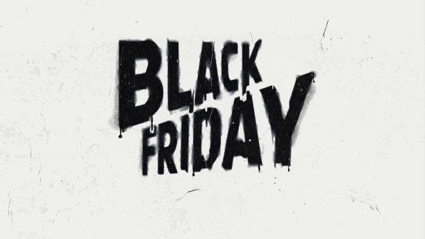 istock Black BLACK FRIDAY text in graffiti-style font with dripping paint effects on white background. 2174924062