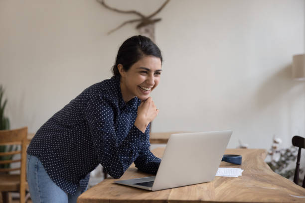 istock Young woman working on computer feel happy got good news 2174924654