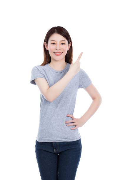 istock Young Asian woman pointing at something 2174931419