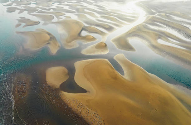 istock Blue sea waves and sand aerial photograph 2174933607