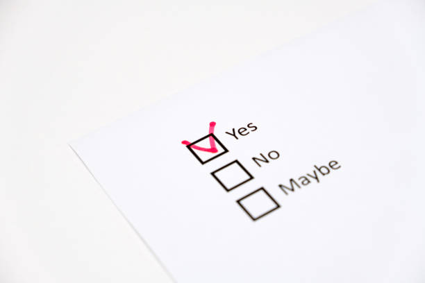 mark Yes checkbox with red on checklist on white paper