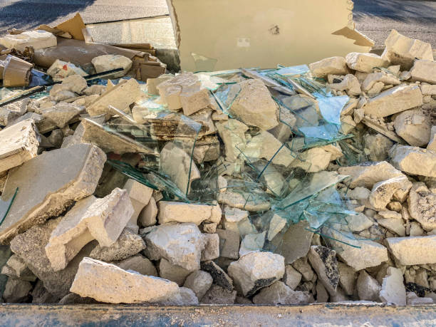 istock Shattered glass with rubble in garbage container 2174941035