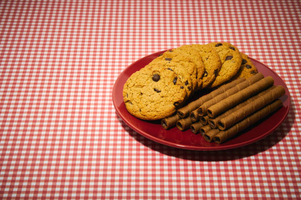 istock Oatmeal cookies and chocolate cigars 2174944232