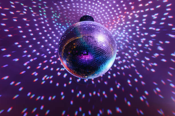 istock disco ball with bright rays, night party background 2174945157