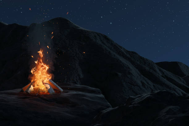 istock Bright bonfire on cliff rocks at night. 3D Rendering 2174951679