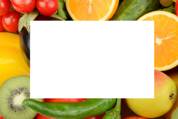 A vibrant assortment of fresh vegetables and fruits including carrots, tomatoes, avocados, and greens, emphasizing health and vitality.