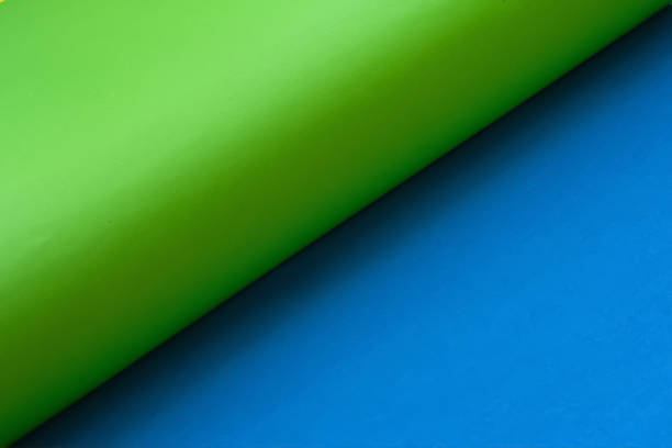 Colored curved paper. Abstract geometric background Blank sheets of colored paper