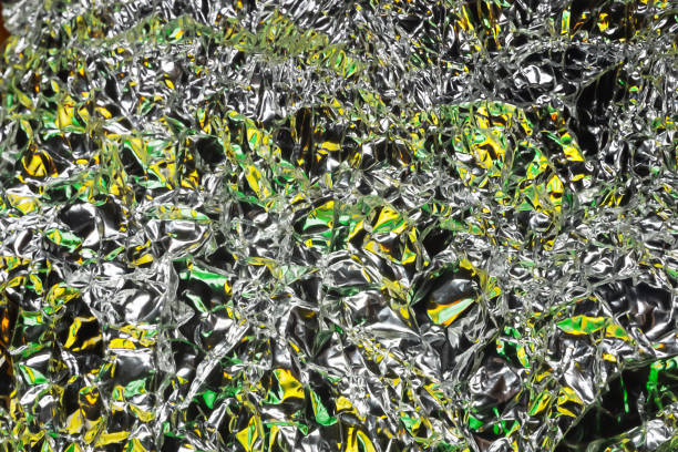 The surface texture background of the silver hard plastic bag